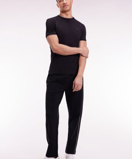 Jogging en molleton gratté noir à passepoil et plis avant coupe droite