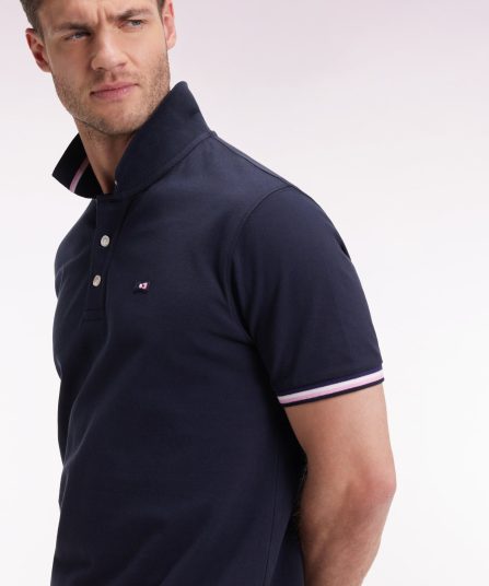 Polo manches courtes en coton marine détails rayés coupe ample