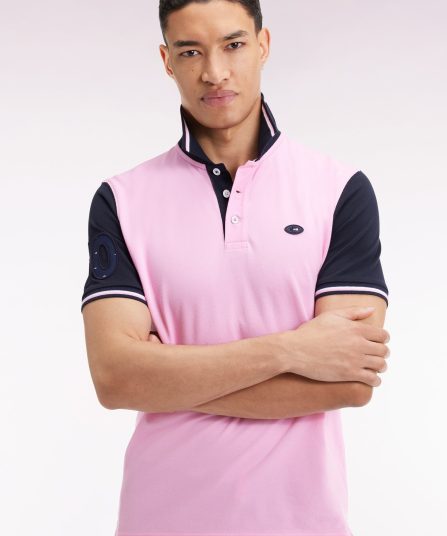 Polo manches courtes rose et marine finitions tricolores coupe droite