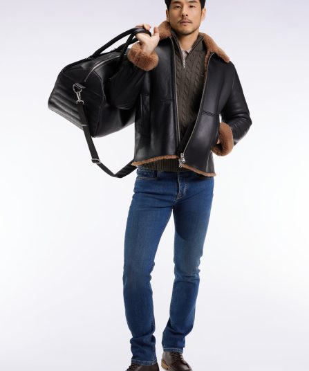 Blouson en peau lainée noir col marron